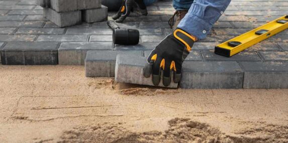 landscaping sand in SW FL being used to lay down stone