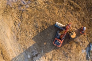 aerial view over heavy machinery on a building construction site in Punta Gorda, FL