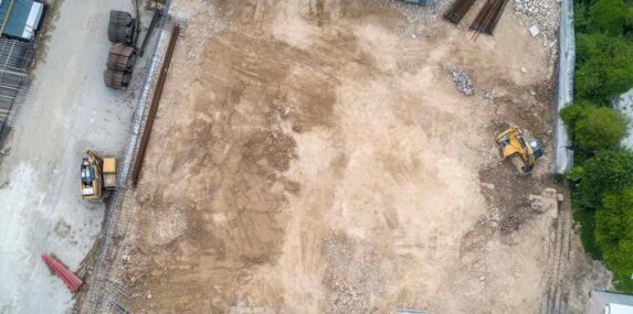 construction site in Punta Gorda aerial view with heavy machinery and earthwork