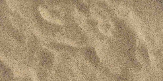 uneven sand texture, beach background, top down view
