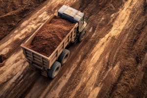 Dump Truck Filled with Dirt Going to Construction Site