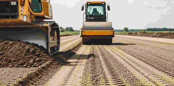 Heavy Machinery Grading Construction Site