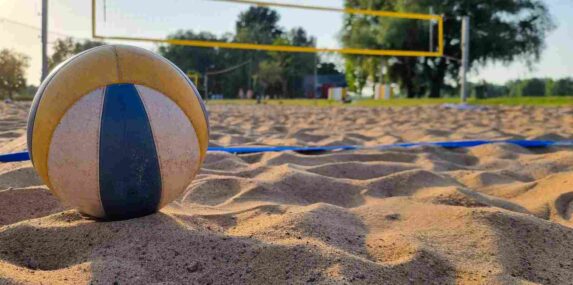 Ball Placed on Professional Grade Sand Volleyball Court