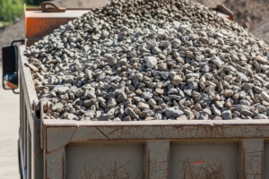 Dump Truck Loaded with Crushed Stone at Supplier Site